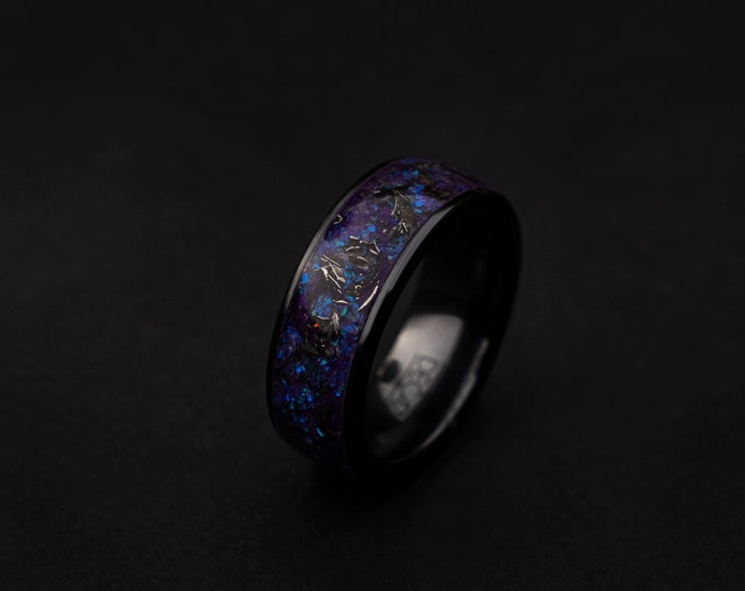 Black ceramic ring with crushed opal.