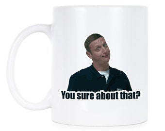 May include: White ceramic mug with a black and white image of a man with the text "You sure about that?" printed on it.