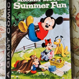 May include: A vintage Dell comic book cover featuring Mickey Mouse, Minnie Mouse, and Pluto. The cover is red, white, and blue with the title "Walt Disney's Mickey Mouse Summer Fun" and the number "1".