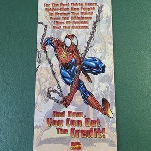May include: A comic book advertisement featuring Spider-Man in a dynamic pose, with text that reads "For The Past Thirty Years, Spider-Man Has Fought To Protect The World From The Villainous Likes Of Venom And The Vulture." The ad also says "And Now, You Can Get The Credit!" and includes the Marvel Comics logo.