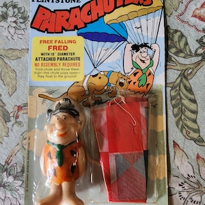 Vintage Fred Flintstone Parachuters Hanna Barbera Gordy International Hong Kong New on Card RARE 1979