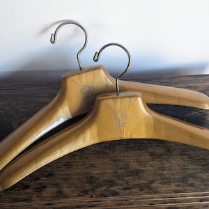 Set of two vintage coat hangers