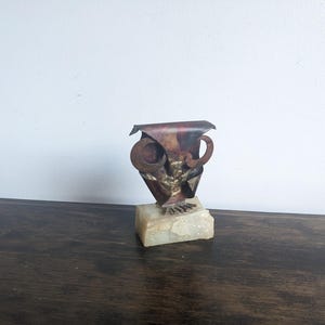 metal owl art sculpture by artist Toma