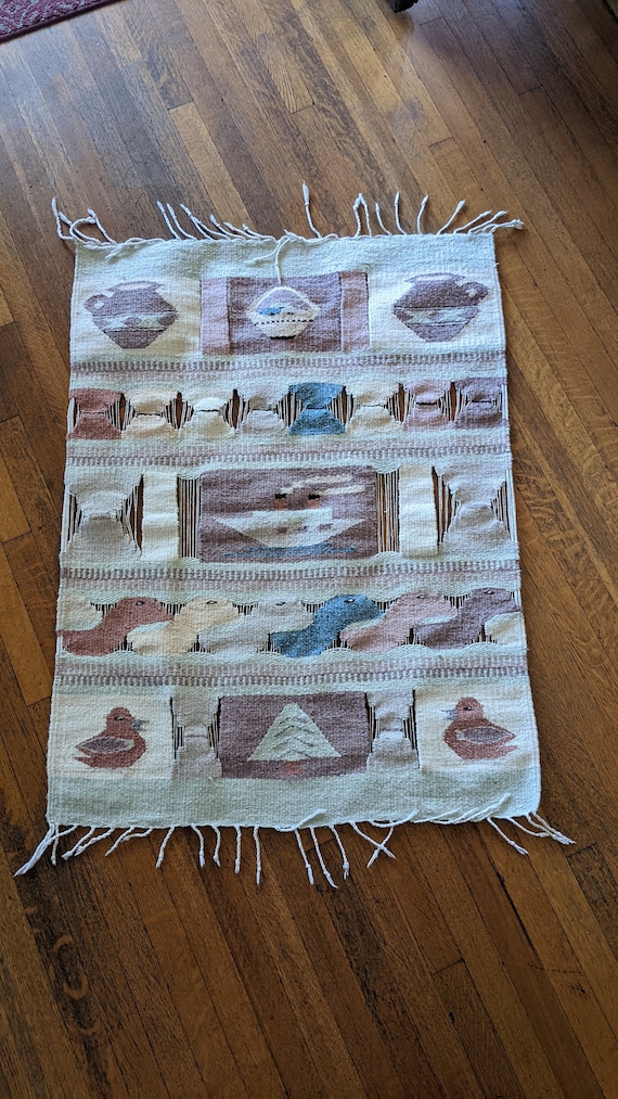 Hand loomed wool rug or wall hanging