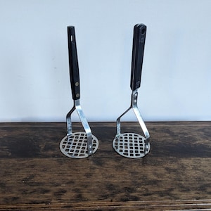 vintage kitchen potato mashers (T)