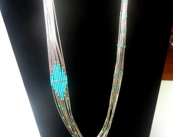 Navajo Liquid Sterling Silver & Turquoise Necklace:  Ten Strands, 23-1/2", 25.6 Grams.
