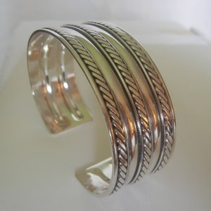 Bali Suarti 5-row sterling silver braided artisan cuff 32.1 grams, 7-1/8&quot; x 7/8&quot;.  Silver cuff bracelet.  Bali Suarti jewelry.  Artisan cuff