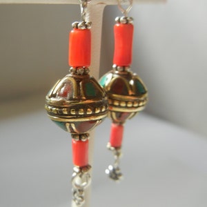 Tibetan-Nepali drop earrings 9 grams.  Tibetan charm earrings.  Nepal charm earrings. Tibetan brass silver turquoise coral dangle earrings.