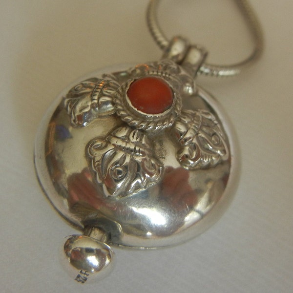 Tibetan Gau box & 21-1/2" snake chain coral sterling silver 22.9 grams, 1-5/8"x1".  Double Dorje Kalachakra Gau box.  Tibetan silver jewelry