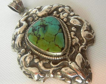 Large Tibetan 900 Silver Turquoise Repousse Pendant: Himalayan Animals