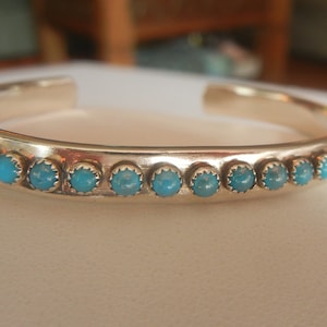 Incredible Swirl Vintage Native American Navajo Turquoise Snake Eyes Sterling Silver Bracelet Incredible Swirl Vintage Native American Navajo Turquoise Snake Eyes Sterling Silver Bracelet