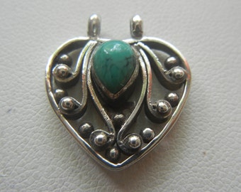 Turquoise & sterling silver heart pendant from Bali 2.7 grams.  Small heart pendant.  Silver and turquoise heart pendant.  Heart jewelry.