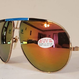Vintage Aviator Sunglasses // Gold metal frames // Blue and black decal browline // 90s // Mirror lenses // summer racing stripes
