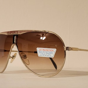 Vintage Aviator Sunglasses // Gold metal frames with red &quot;Sports&quot; brow // 80s + 90s glasses // Sport racing true vintage retro NOS