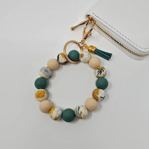 Llavero de pulsera con margaritas y eucalipto, pulsera elástica con borlas de silicona, accesorios para el coche, llavero, regalo para mamá, cartera, llavero para otoño e invierno, para esposa