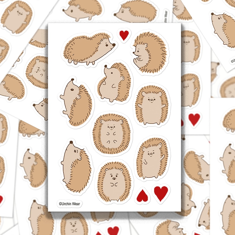 May include: A sheet of stickers featuring 10 adorable brown hedgehogs in various poses, including some with hearts. The stickers are perfect for adding a touch of whimsy to journals, laptops, water bottles, and more.