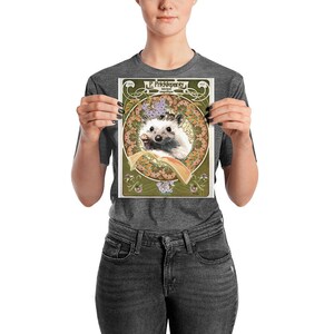 May include: A vintage-style illustration of a hedgehog holding a slice of orange. The hedgehog is surrounded by a decorative floral border with the text "P. Pricklepants" at the top.