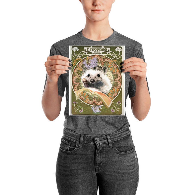 May include: A vintage-style illustration of a hedgehog holding a slice of orange. The hedgehog is surrounded by a decorative floral border with the text "P. Pricklepants" at the top.