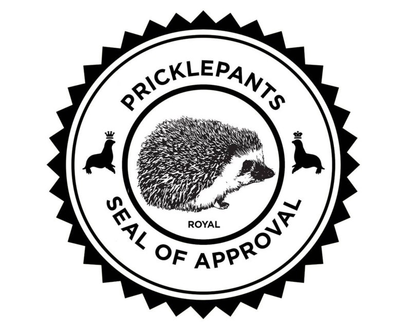 May include: Black and white illustration of a seal with a crown on its head, a hedgehog, and another seal with a crown on its head. The text "Pricklepants Seal of Royal Approval" is written around the image.
