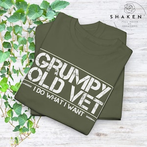 May include: A green t-shirt with a white graphic that says "Grumpy Old Vet - I Do What I Want".