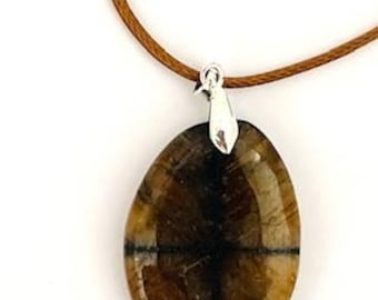 Natural stone chiastolite pendant - energy alignment centering stability