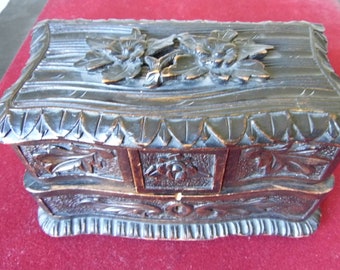 Jewelry box. Black Forest. Germany. Early 20th. Carved wood. flower decorations and embellishments. Lined with red felt. Craft