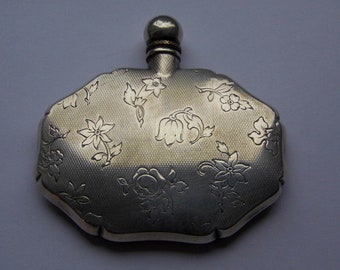 Perfume bottle. Salt flask. 835 silver. Engraved. Floral decorations. Refinement. Screw cap.