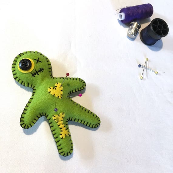 green voodoo doll
