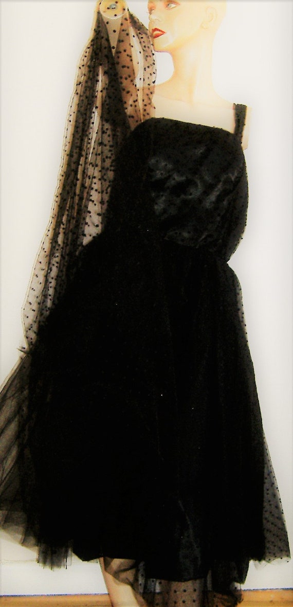 black dress with net overlay