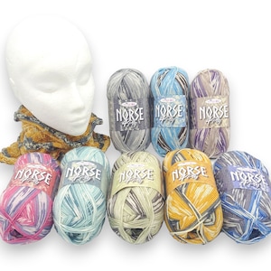 May include: A selection of multi-coloured yarn balls, each labelled "Norse 4ply". The yarn features shades of blue, grey, yellow, purple, and pink. A knitted cowl and a styrofoam head are also visible in the image.