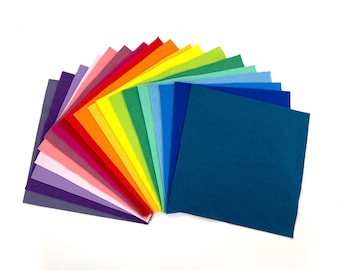 May include: A rainbow assortment of felt squares in various colors, including purple, pink, red, orange, yellow, green, blue, and teal.