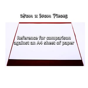 May include: A white sheet of paper with a red border, measuring 25cm x 30cm. The text "Reference for comparison against an A4 sheet of paper" is printed on the paper.