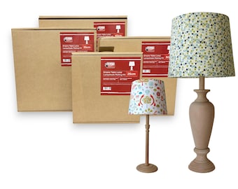 May include: A collection of Empire table lamps and lampshade making kits. The lampshades feature colorful patterns, and the wooden lamp bases have a classic design. The kits are in cardboard boxes with red labels, and the dimensions are 25cm, 30cm, 35cm, and 40cm.