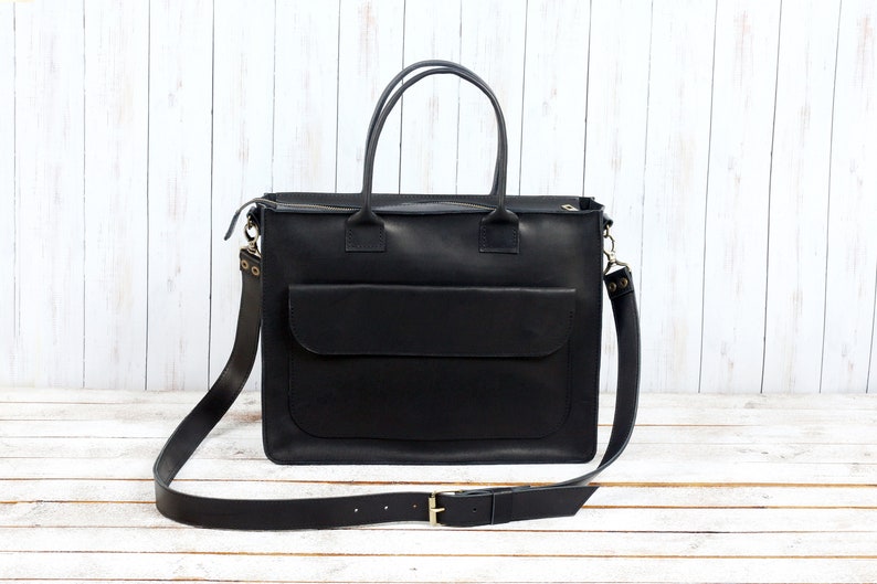 vans black backpack women's