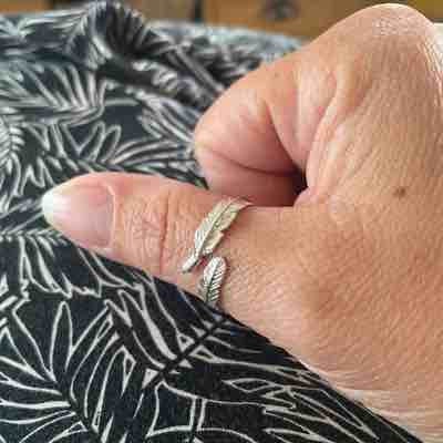 Fiyah feather ring meaning sale