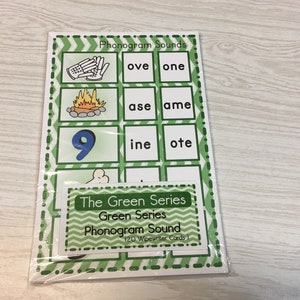 May include: A set of green and white wipe-clean cards with images and phonogram sounds. The cards are labeled "The Green Series Green Series Phonogram Sound (120 Wipewriter Cards)".
