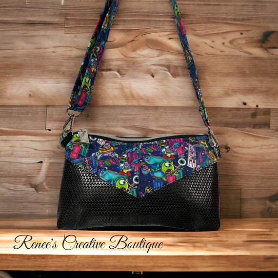 Monster Mayhem Crossbody – Monsters Inc Inspired Purse with Boo’s Door Zipper Pull & Adjustable Strap