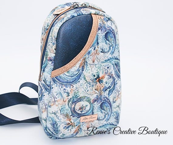 Blue Paisley Sling Backpack: Rose Gold Accents, Travel Carryon