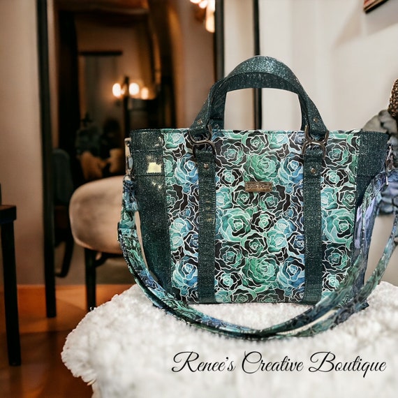 Blue green glittery large tote bag, lots of pockets, crossbody strap and handles, vinyl exterior, waterproof canvas interior, ready to ship