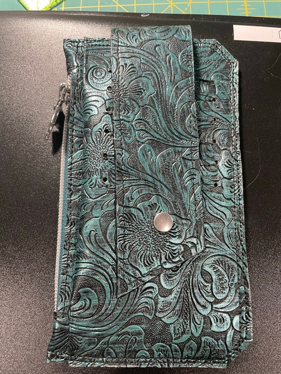 Green tooled faux leather wallet