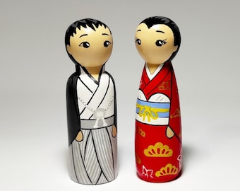 Hand-Painted Japanese Wooden Peg Dolls: Traditional Art Figurines (Set of 2)