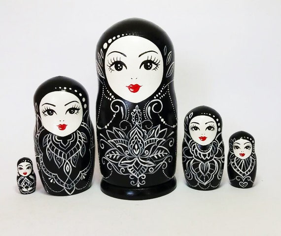 black wooden dolls