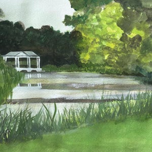 May include: A watercolor painting depicting a white gazebo situated on the edge of a calm pond. The scene features lush green trees and foliage surrounding the water, with the structure reflected on the surface of the pond in soft, muted tones.
