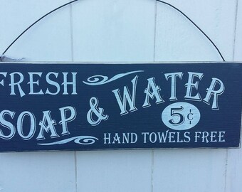 Fresh soap and water wooden sign.