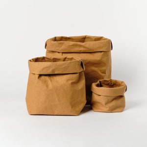 Brown Paper bag storage made from washable, reusable and recycled paper. Vegan Leather brown bag for your home image 2