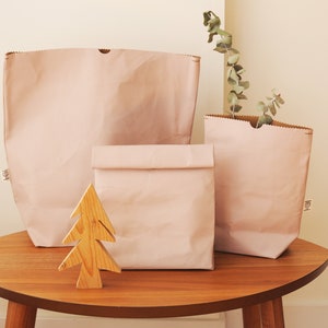 Lunch bags made from washable and reusable paper in PINK.. Vegan Leather bag as storage and planter