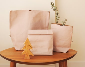 Lunch bags made from washable and reusable paper in PINK.. Vegan Leather bag as storage and planter