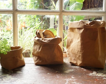 Brown Paper bag storage made from washable, reusable and recycled paper. Vegan Leather brown bag for your home