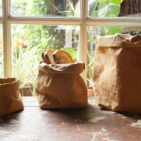 Brown Paper bag storage made from washable, reusable and recycled paper. Vegan Leather brown bag for your home