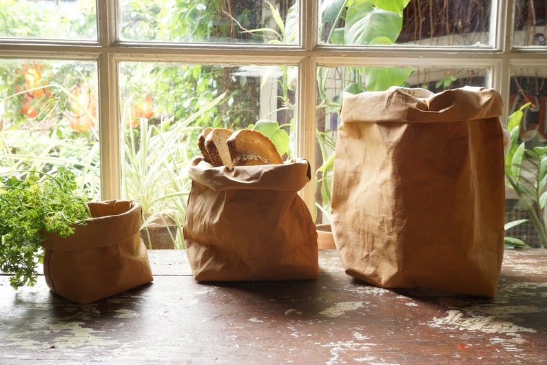 Brown Paper bag storage made from washable, reusable and recycled paper. Vegan Leather brown bag for your home image 1